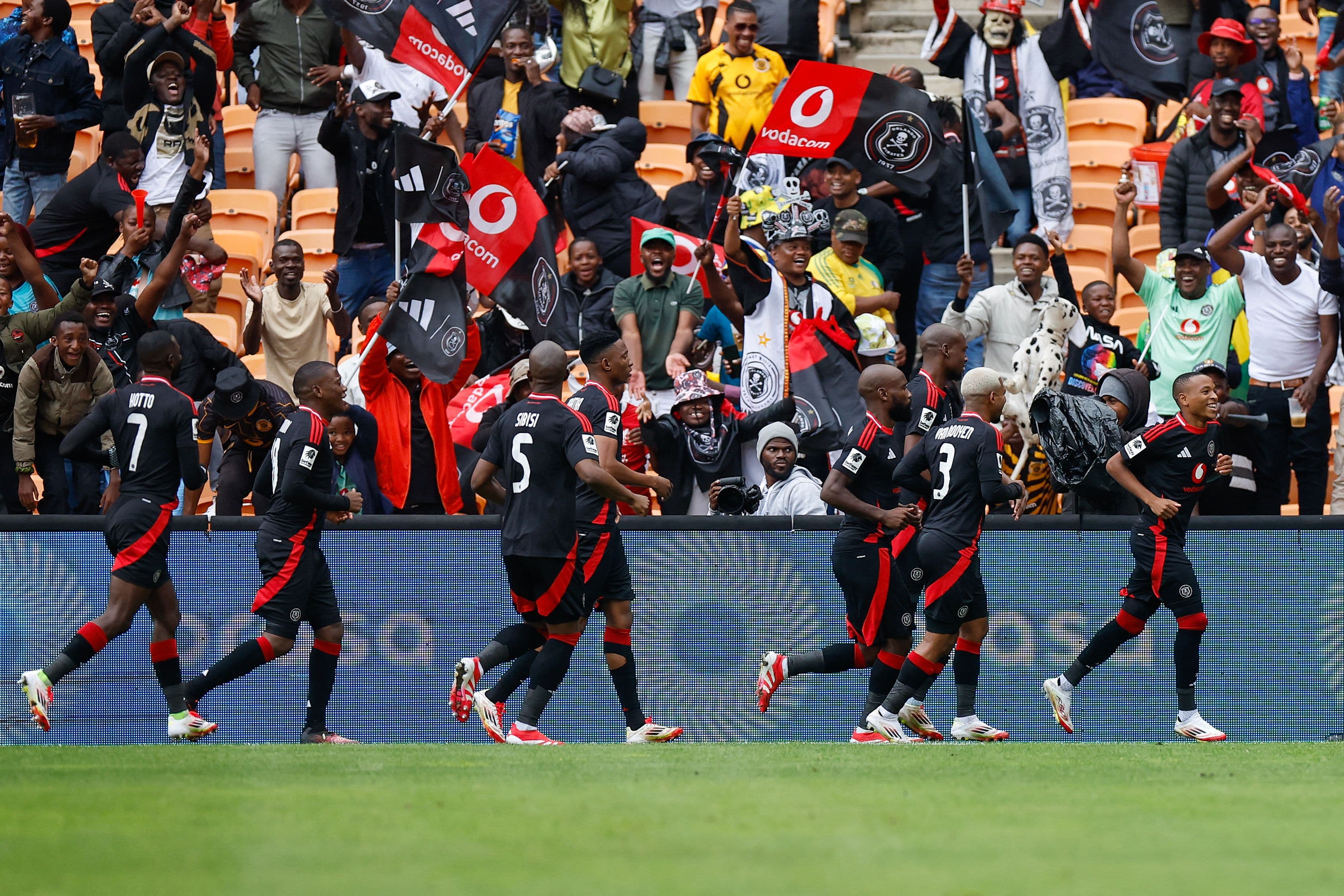 Relebohile Mofokeng (R) celebrates his goal during the Premier Soccer League (PSL)