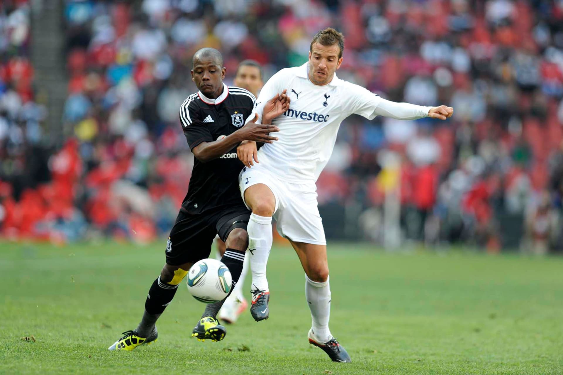 Orlando Pirates' Ruben Cloete (L) and Tl